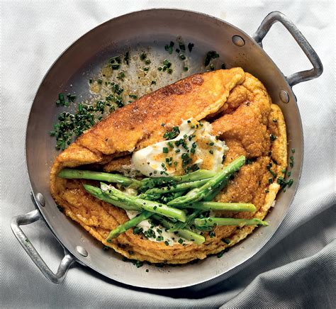 The Ultimate Soufflé Omelette With Chive Crème Fraîche And Asparagus