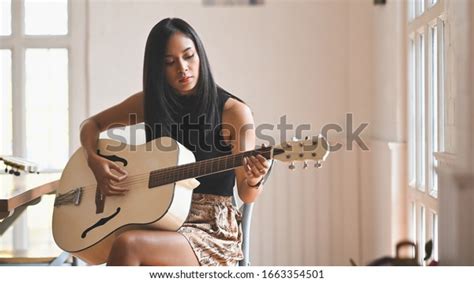 Sexy Brunette Woman Playing Acoustic Guitar Stock Photo Shutterstock