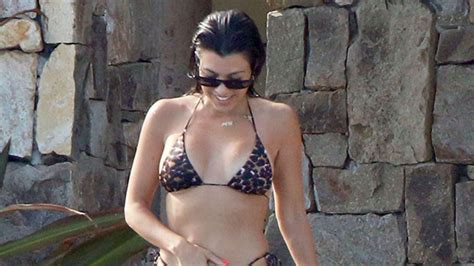 Kourtney Kardashians Pink String Bikini And Bucket Hat Video Watch Hollywood Life