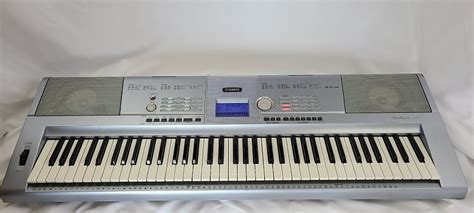 Yamaha Portable Grand Piano DGX-203 Piano Electronic Keyboard | Reverb