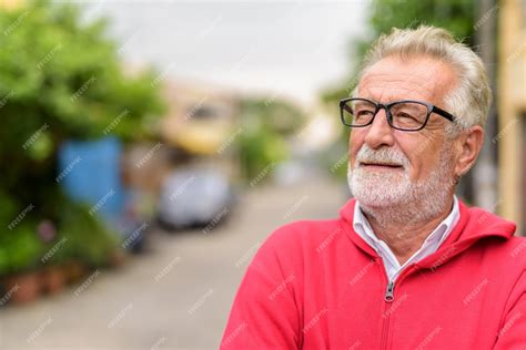 Premium Photo Close Up Of Happy Handsome Senior Bearded Man Smiling