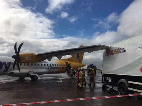 Plane Crashes Into Catering Truck At Manchester Airport Leaving Wing