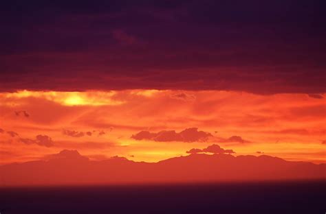 mountain under clouds during sunset 4962242 Stock Photo at Vecteezy