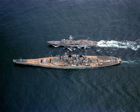 An Aerial Port Beam View Of The Battleship USS IOWA BB 61 Refueling