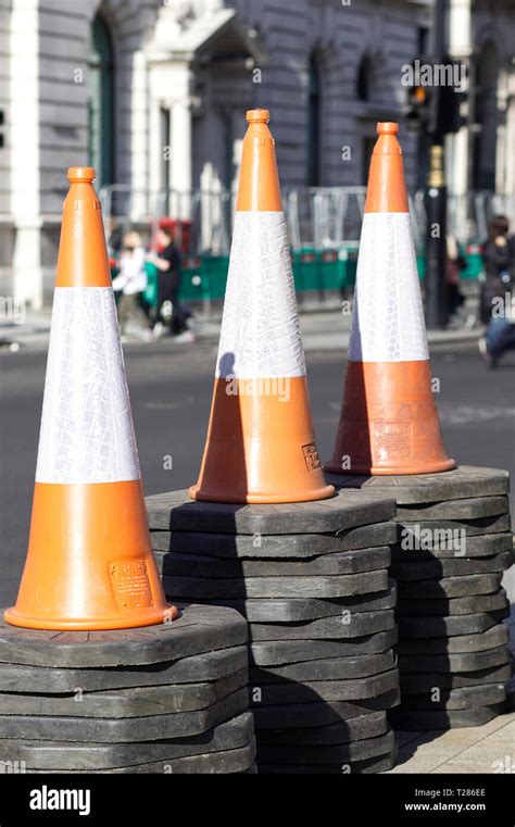 Stacked Traffic Cones On The Roadside In London Stock Photo Alamy