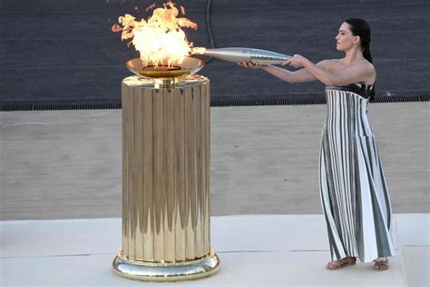 Poignant Ceremony As Greece Hands Over Olympic Torch For Games To