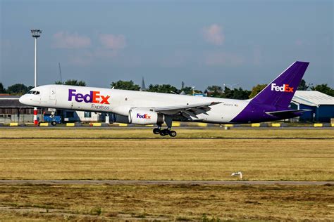 Fedex Express cargo plane at airport. Air freight and shipping ...