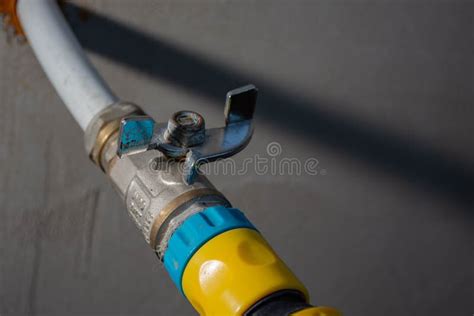 Faucet on a plastic pipe stock photo. Image of construction - 197408684