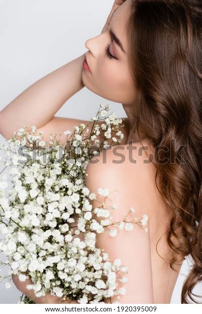 Shirtless Brunette Woman Holding White Flowers Stock Photo 1920395009 Shutterstock