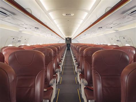 Empty Interior Cabin of an Airbus A320 Neo with Red Seats and Trim ...