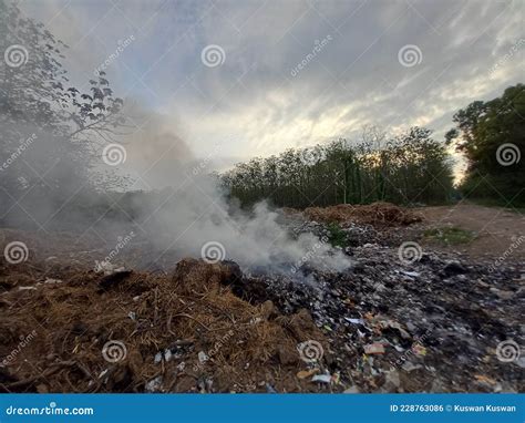 Burning trash in landfills stock photo. Image of dump - 228763086