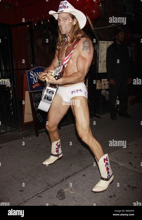 Robert John Burck Aka The Naked Cowboy Hosts The Grand Opening Of The