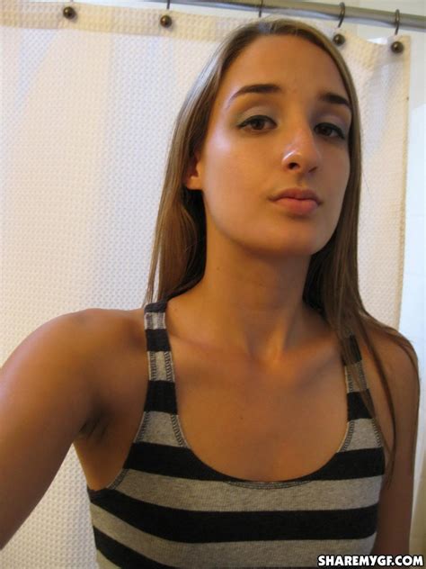 Cute Girlfriend Shows Off Her Perky Tits And Round Ass As She Takes Selfshot Mirror Pictures