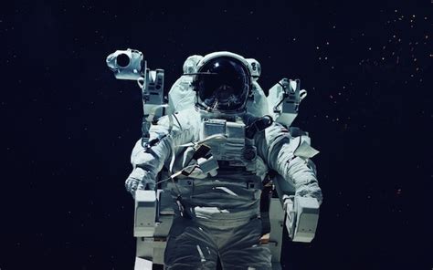 Premium Photo | Astronaut at spacewalk