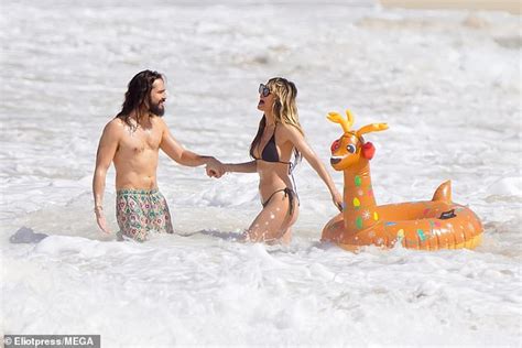 Heidi Klum Sizzles In A Tiny Black Bikini On A Beach In St Barts As She Packs On The Pda