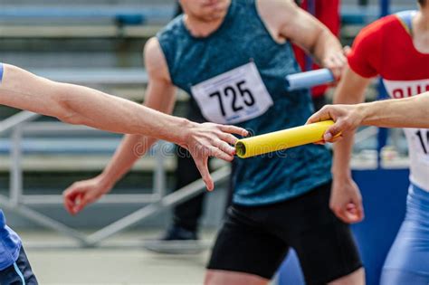 Men Relay Race Baton Passing In Summer Athletics Championship Editorial Photo Image Of Hands