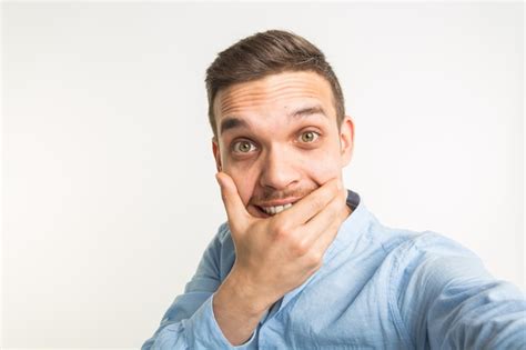 Premium Photo Close Up Portrait Of A Cheerful Bearded Man Taking