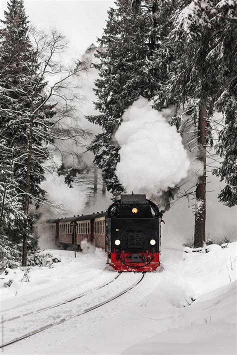 "Steam Train Riding Through Winter Forest" by Stocksy Contributor ...