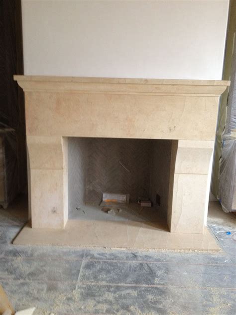 Solid limestone fireplace | Limestone fireplace, Fireplace decor, Fireplace