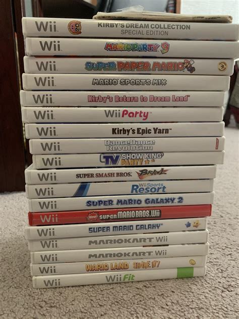 Here Are All My Wii Games Wii Sports Is At The Top Not Visible Through That Case Anything