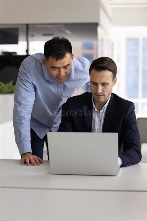 boss watching manager work result standing  employee workplace stock