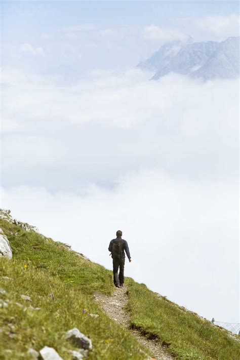 Austria, South Tyrol, hiker on hiking trail stock photo