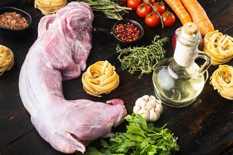 Premium Photo Raw Fresh Whole Rabbit Cut For Stewing Set On Old Dark