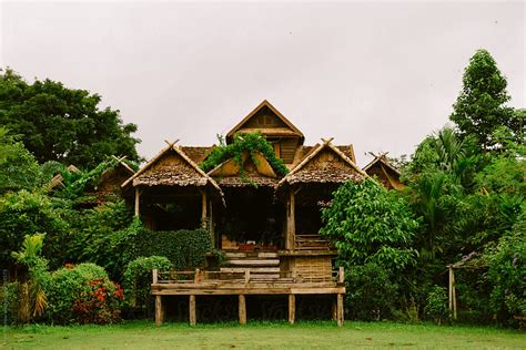 "Traditional Thai House In Jungle" by Stocksy Contributor "Jesse Morrow" - Stocksy