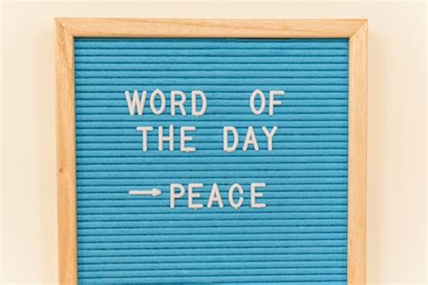 Premium Photo | Panel with the phrase of the day, peace, to inspire ...