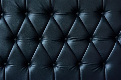 Premium Photo | Close-up dark blue sofa leather texture for background