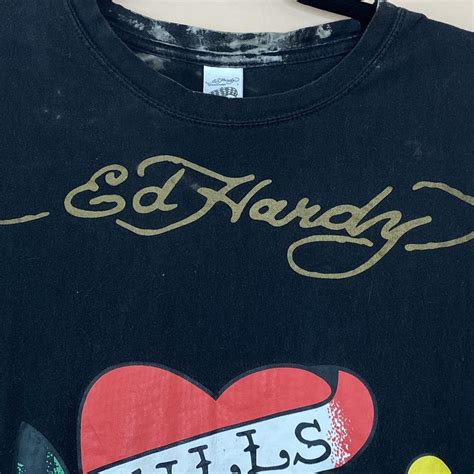 ed hardy love kills slowly tshirt , has some bleach... - Depop