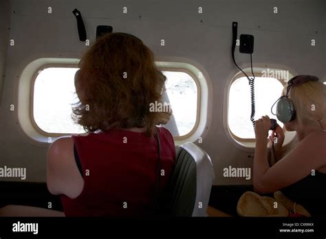 passengers looking out of window interior of dehaviland dhc-3 otter ...