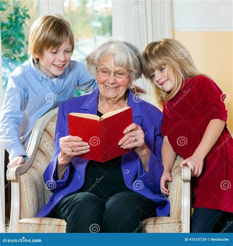 Grandmother Reading Book To Grand Children Stock Image Image Of