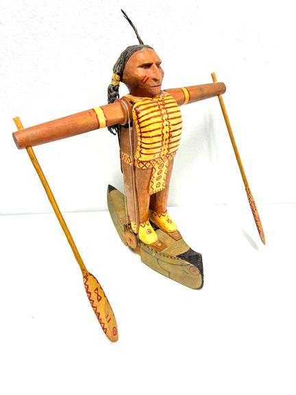 HAND CARVED NATIVE AMERICAN INDIAN W/ CANOE SCULPTURE - Auctionology LLC