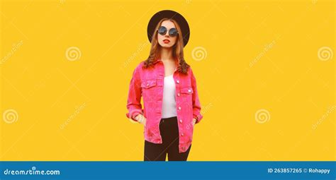 Portrait Of Stylish Modern Young Woman Wearing Pink Jacket Black Round