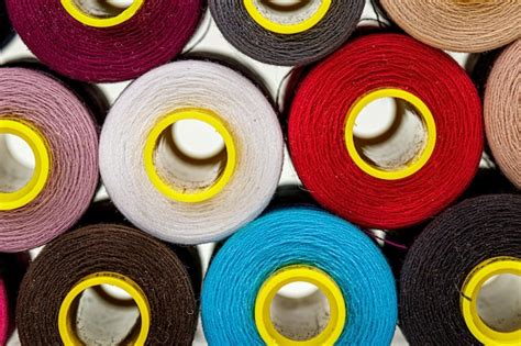 Premium Photo Set Of Multicolored Spools Of Thread For Sewing