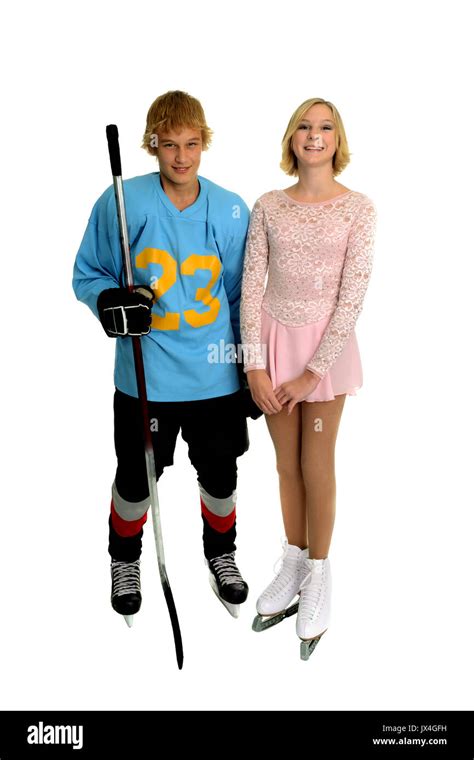 A teenage winter ice sport couple, hockey player and figure skater ...