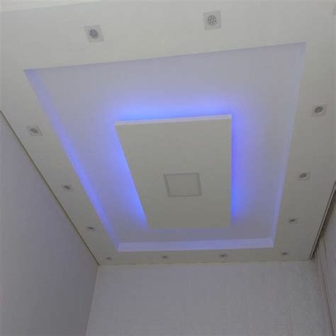 the ceiling is white and has blue lights on it