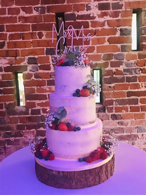 Tier Semi Naked Wedding Cake With Fresh Fruit Gypsophilia And