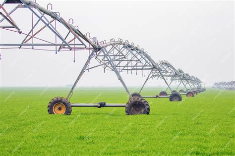 Premium Photo | Center pivot irrigation system in field, agriculture concept