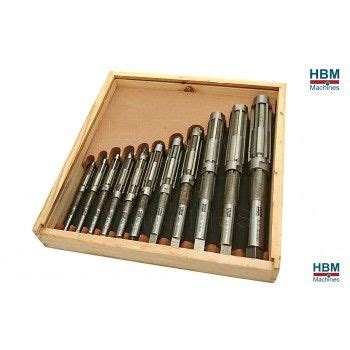 A Wooden Box Filled With Lots Of Different Types Of Screwdrivers In It