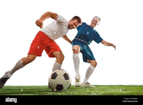 Football Players Tackling For The Ball Over White Background