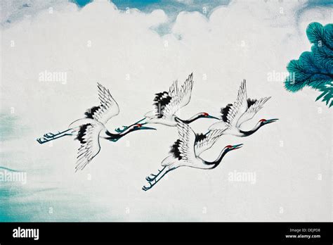 flying chinese crane bird painting on the wall Stock Photo - Alamy