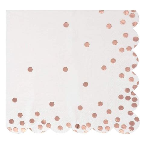 A White Napkin With Rose Gold Dots On It