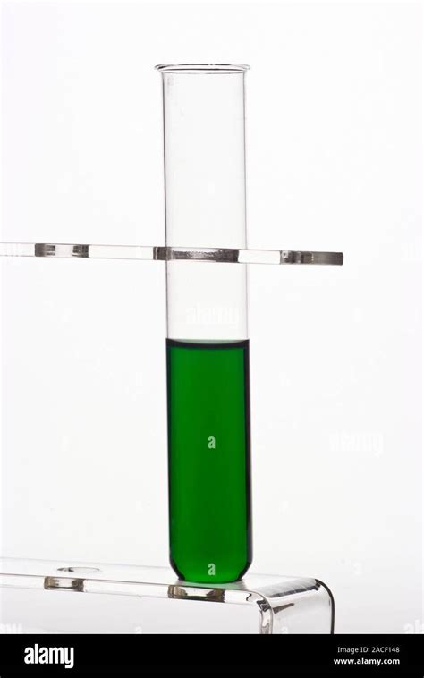 Chromium (III) chloride (CrCl3) solution in a test tube. The green ...