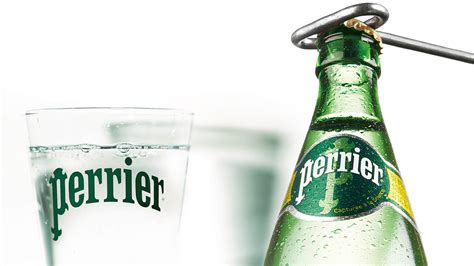 perrier reinvents  universal iconic design  dragon rouge global