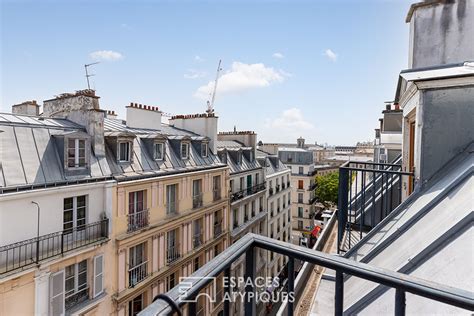 Vente Studio en dernier étage avec balconnets à PARIS 21 m2 Espaces