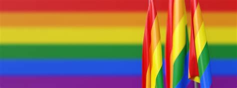 Premium Photo Pride Flags On Poles Lgbt Rainbow Colors Background Banner