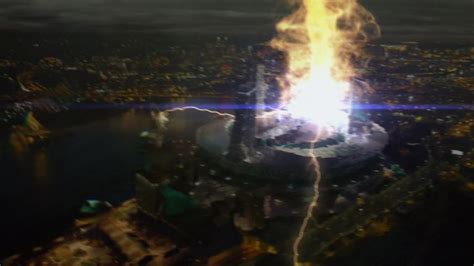 An Aerial View Of A Large Tower With Fire Coming Out Of It S Top