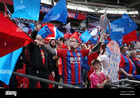 Crystal Palace fans holding aloft a home made FA Cup Trophy and ...